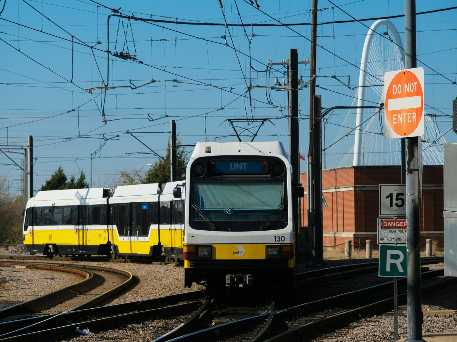 Dallas DART yellow train. Margaret Hunt Hill Bridge can be seen in the background